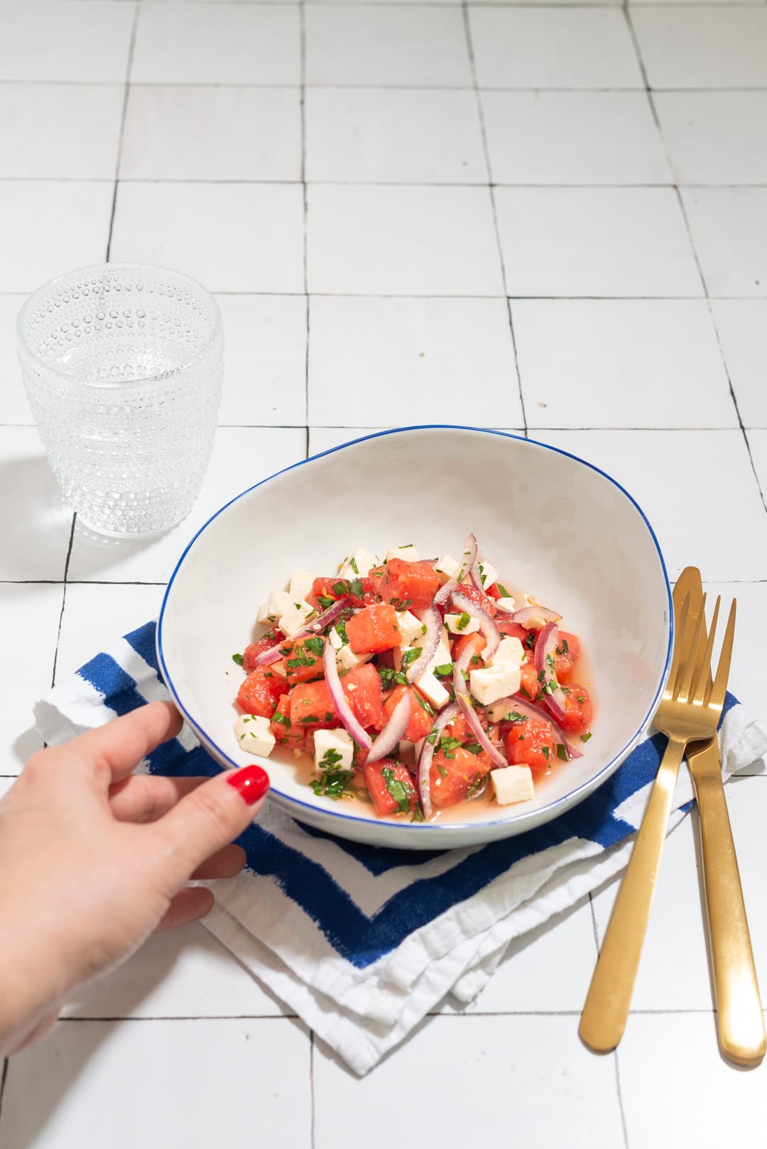A fresh watermelon and feta salad with coastal styling plated by a private chef in the Hamptons