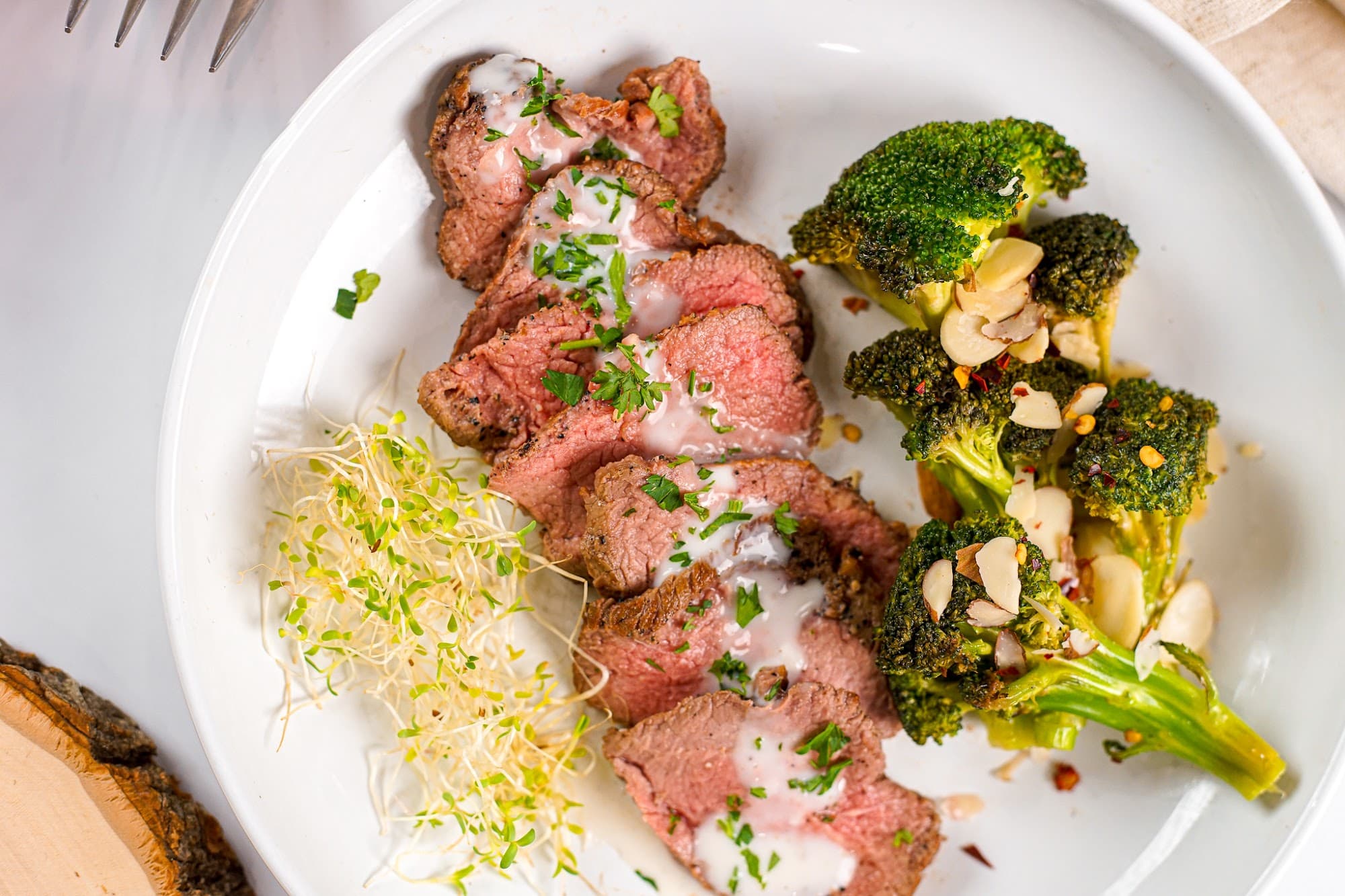 A plated beef main course served at an executive dinner in Short Hills