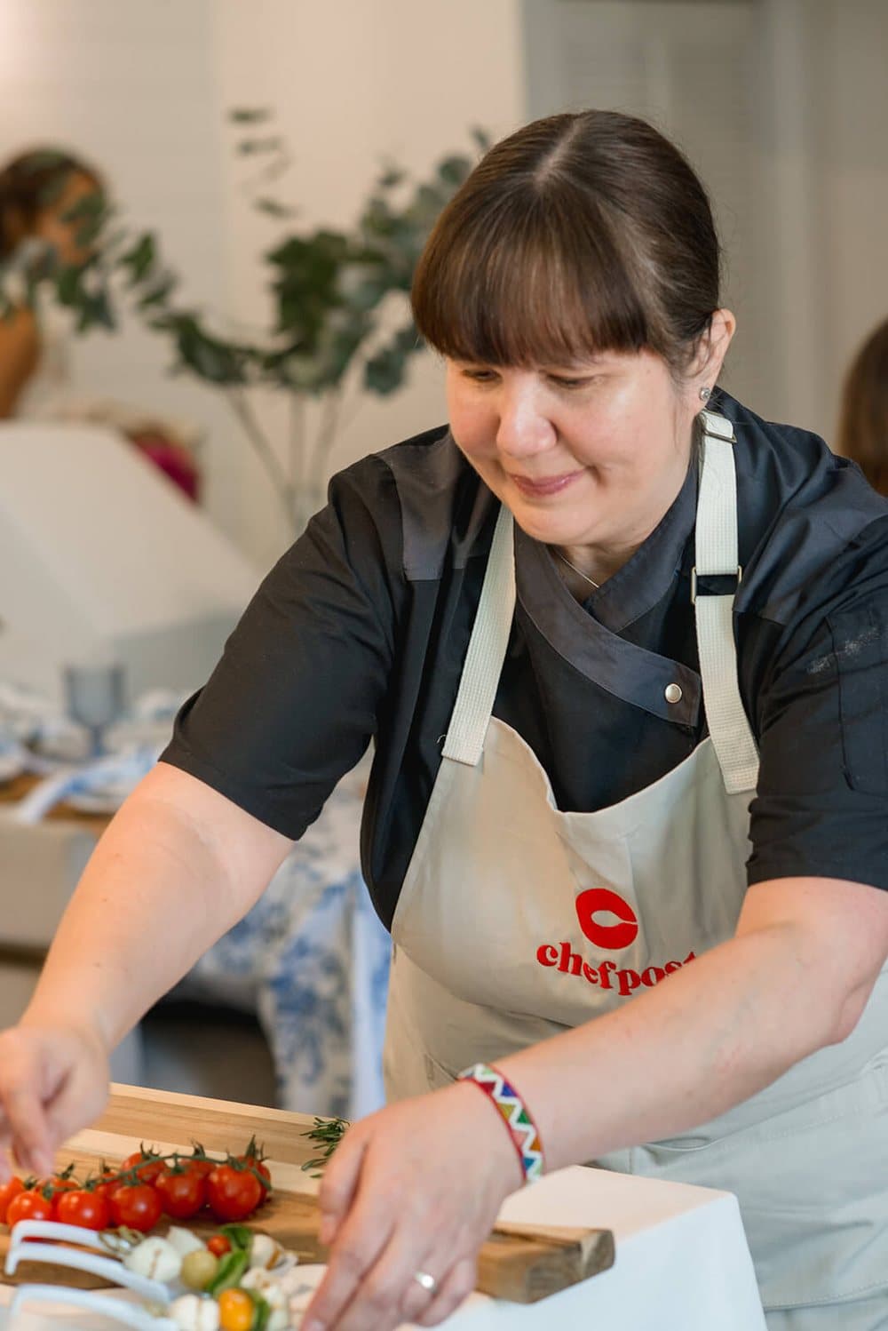 A Chefpost private chef plating a course at a client's table
