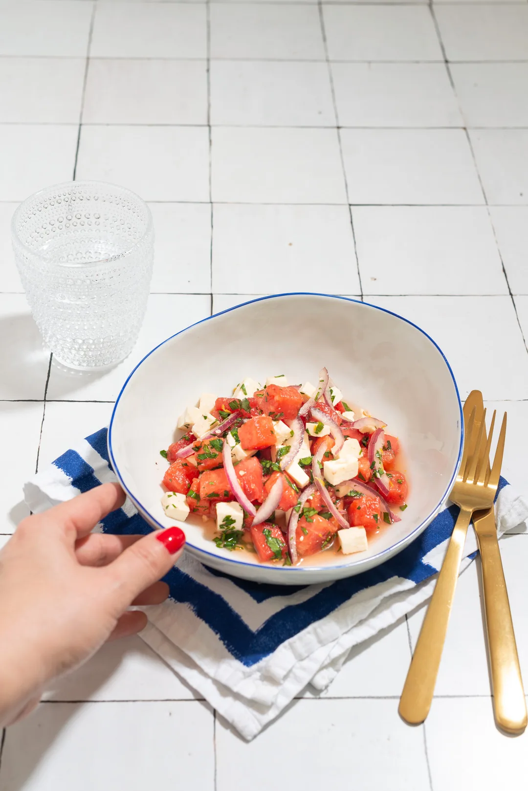 A fresh watermelon and feta salad with coastal styling plated by a private chef in the Hamptons