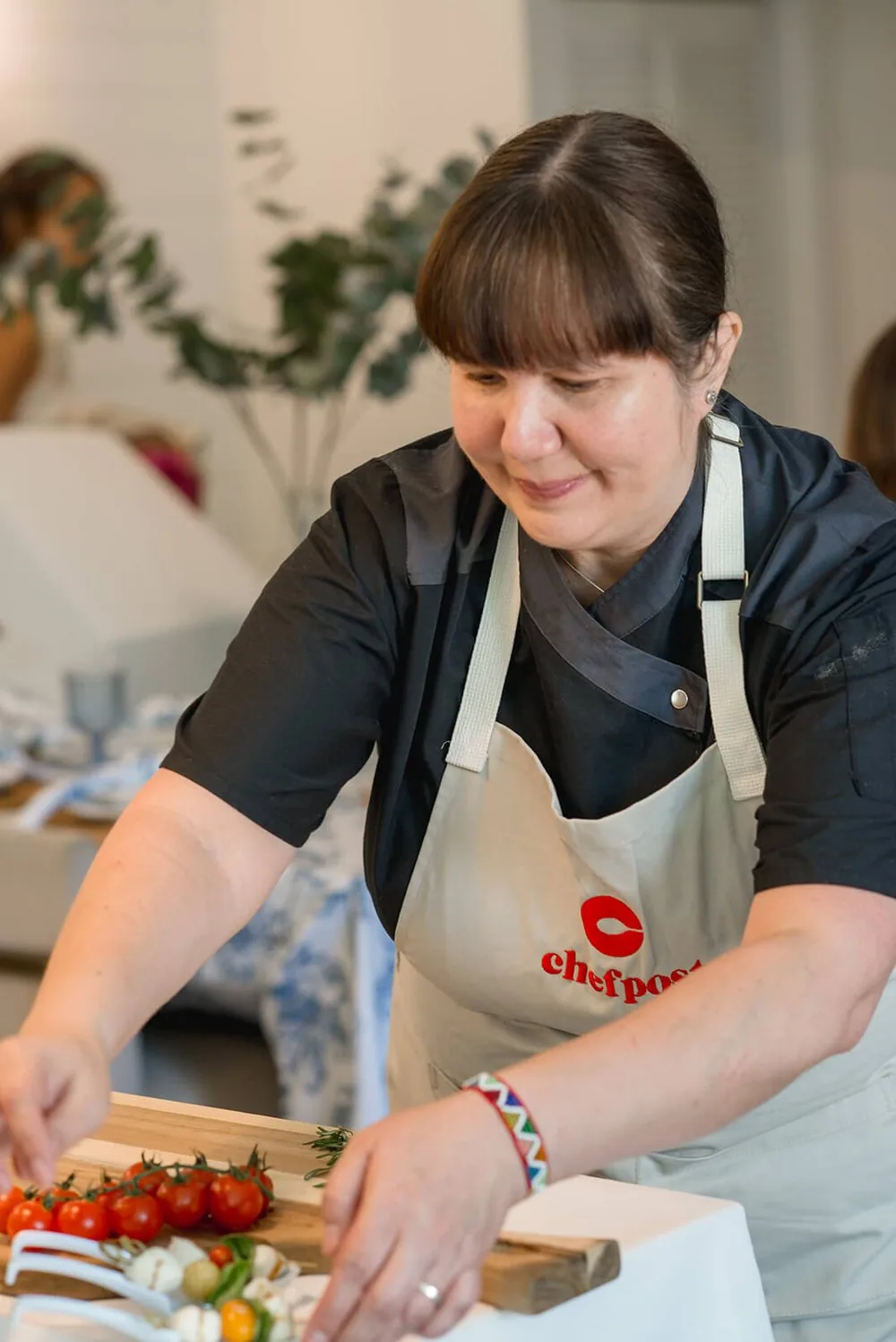 A Chefpost private chef plating a course at a client's table