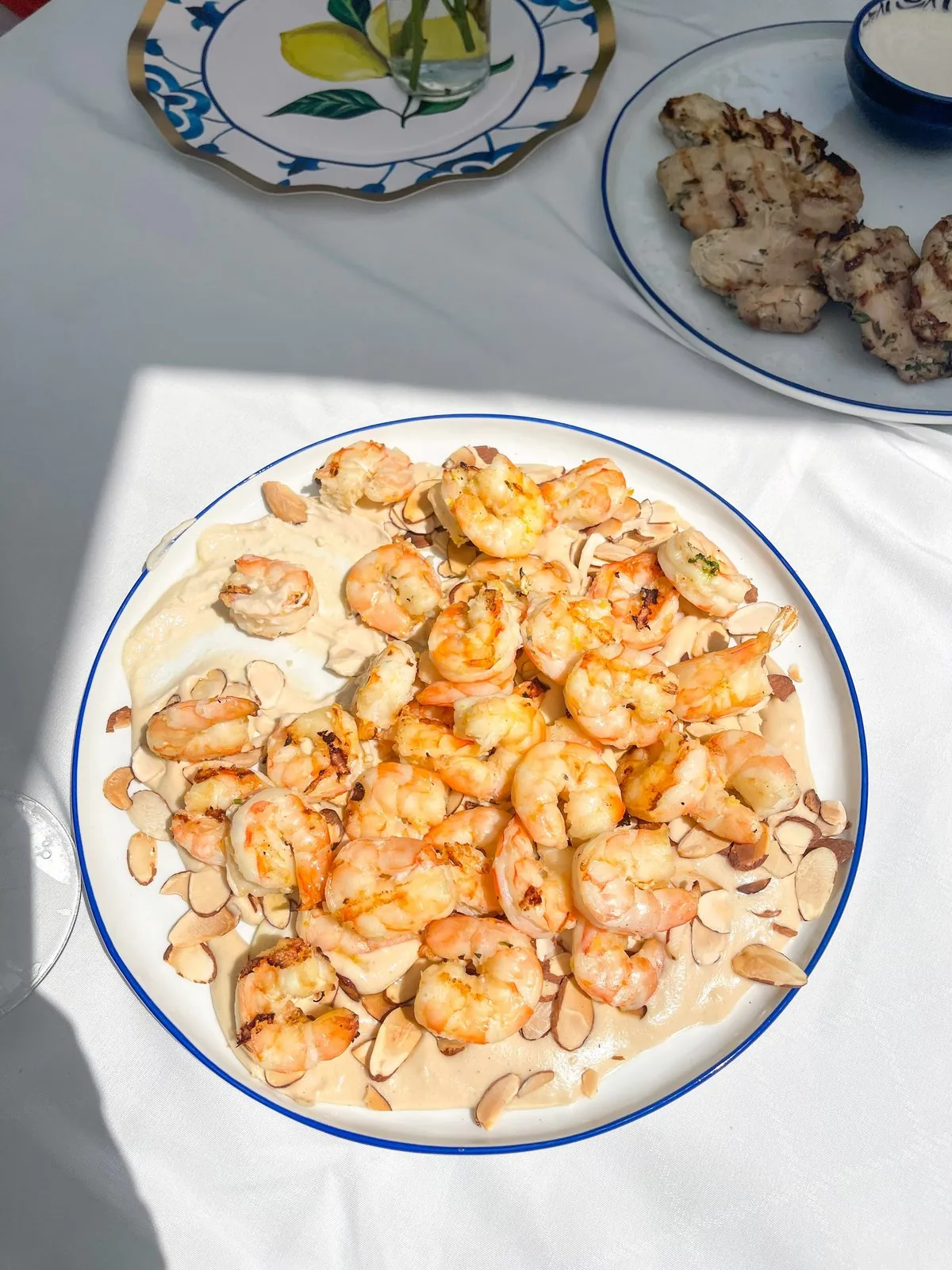 A seafood dish plated by a private chef for a New England dinner at home