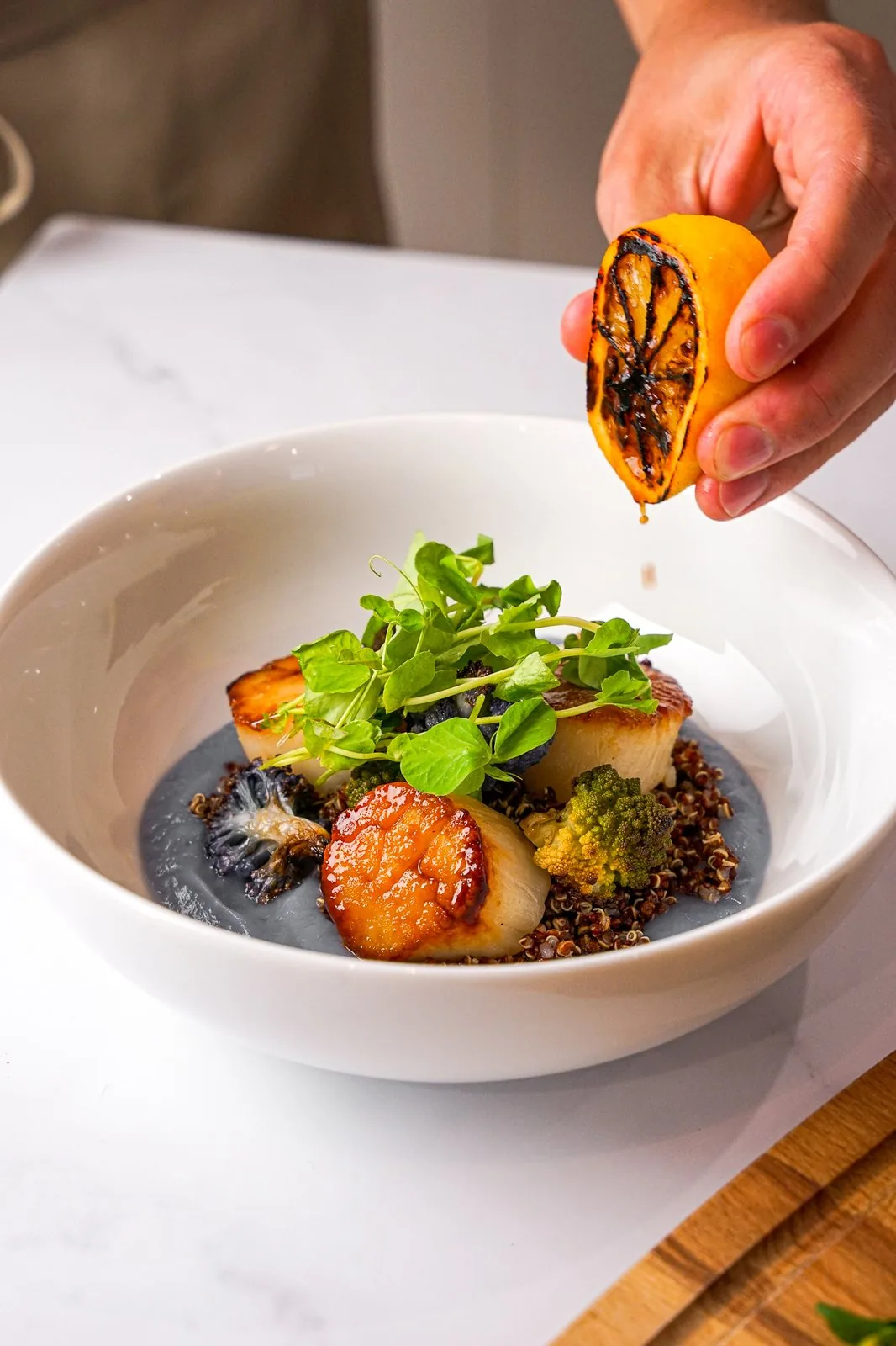 Seared day-boat scallops plated by a private chef for a Cape Cod dinner